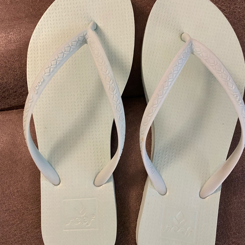 Reef light mint flip flops